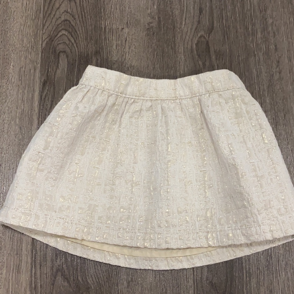 White and gold mini skirt